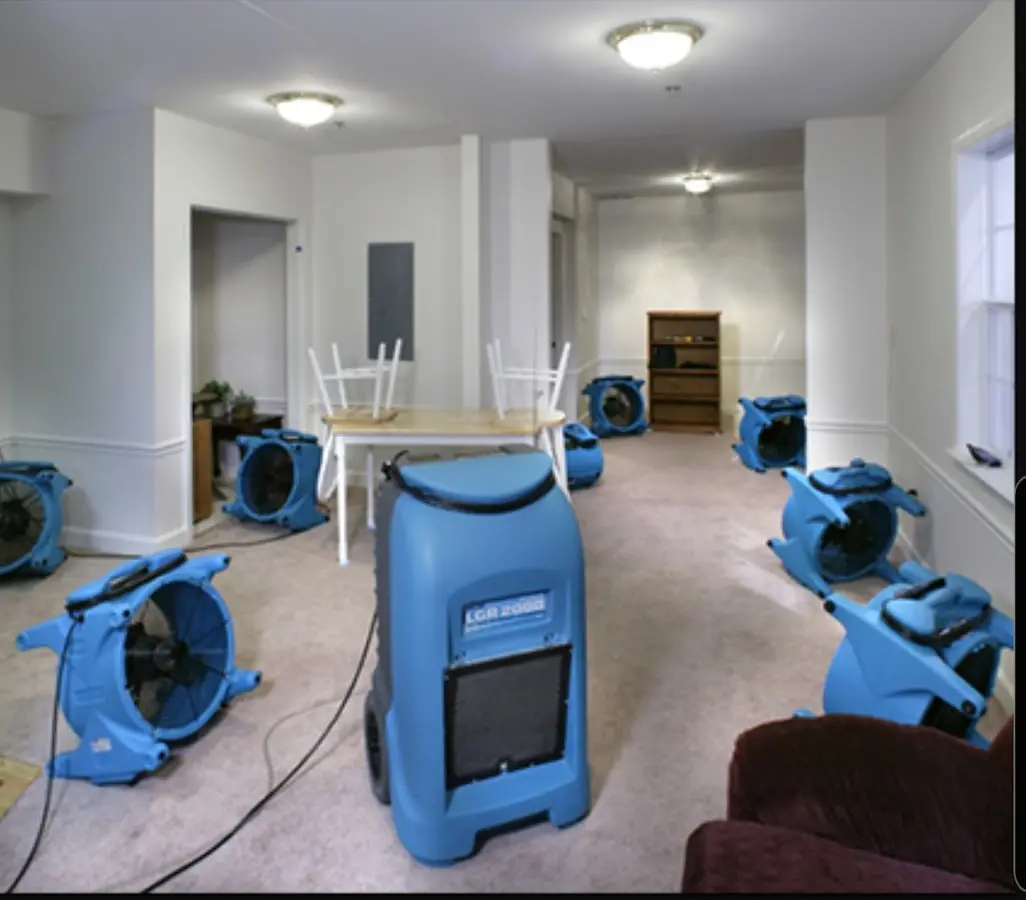 Air movers and dehumidifier setup for Water Damage Restoration in Mineola